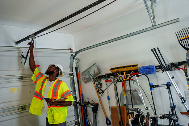Professional Garage Door Panel Replacement technician working in West Kennebunk, ME